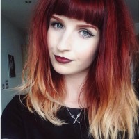 Medium Wavy Hairstyle with Bangs