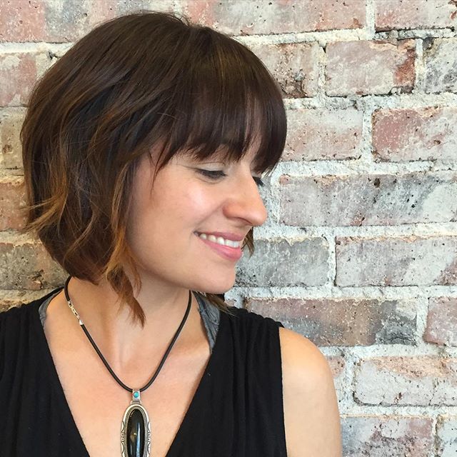 Pretty short bob hairstyle with bangs for women
