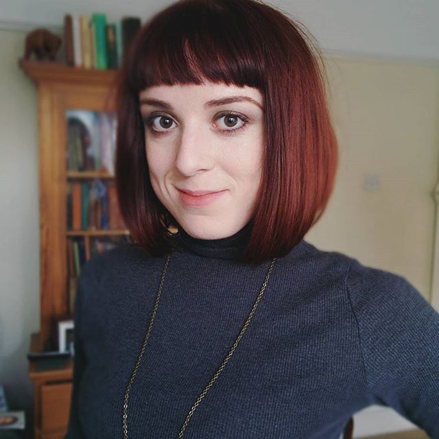 short red blunt bob haircut with blunt bangs