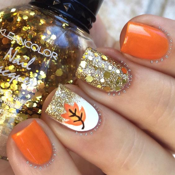 Orange Nails with Glitter via