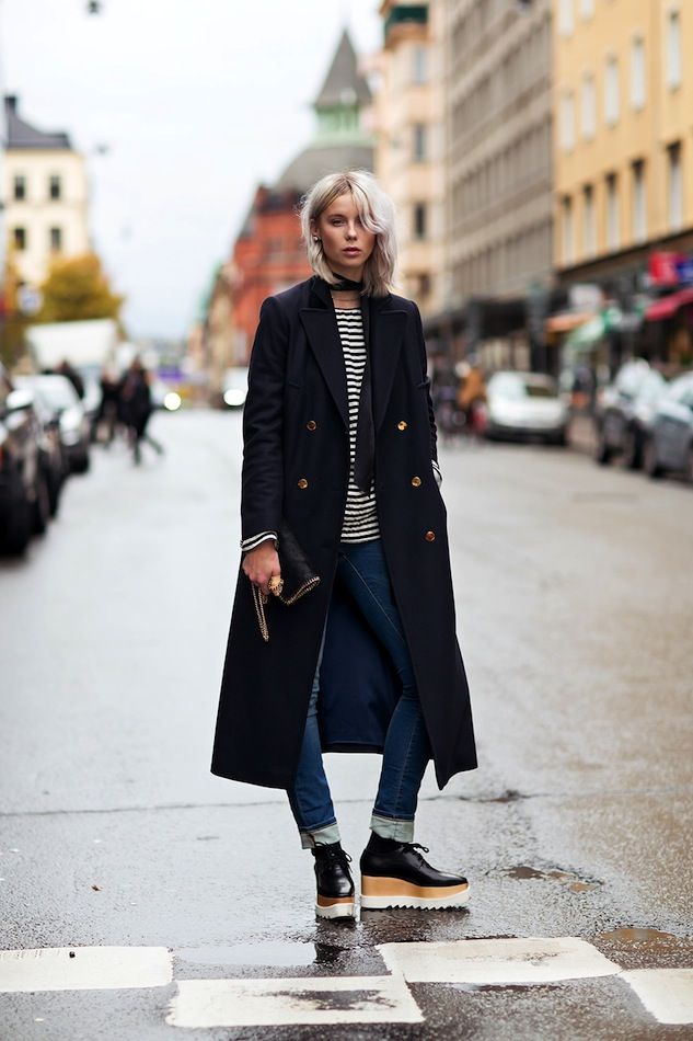 Striped Top, Jeans and Black Trench Coat via