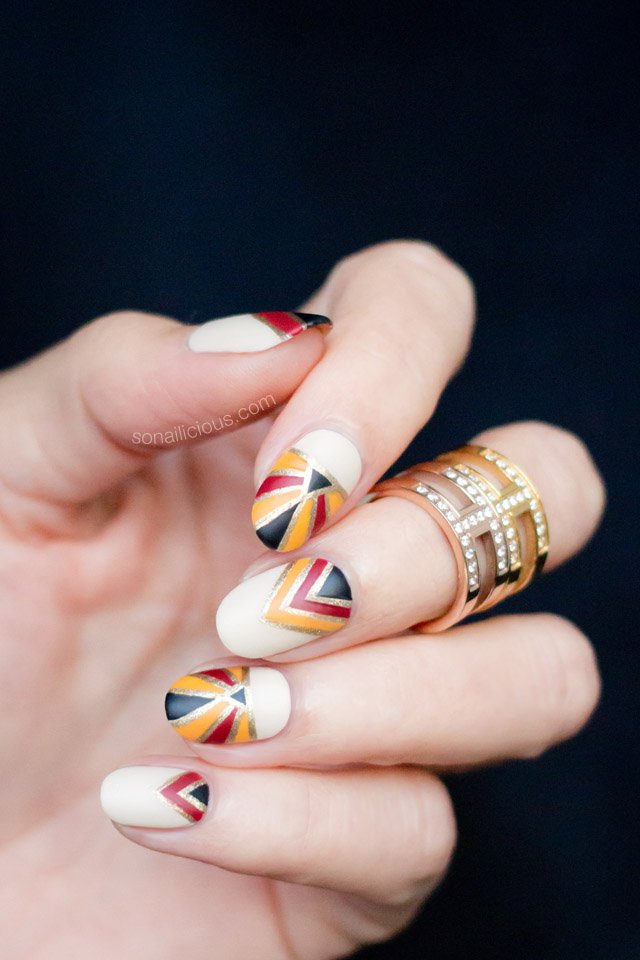 White, Yellow, Red and Black Nails via