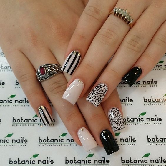 beige-nails-with-black-patterns via