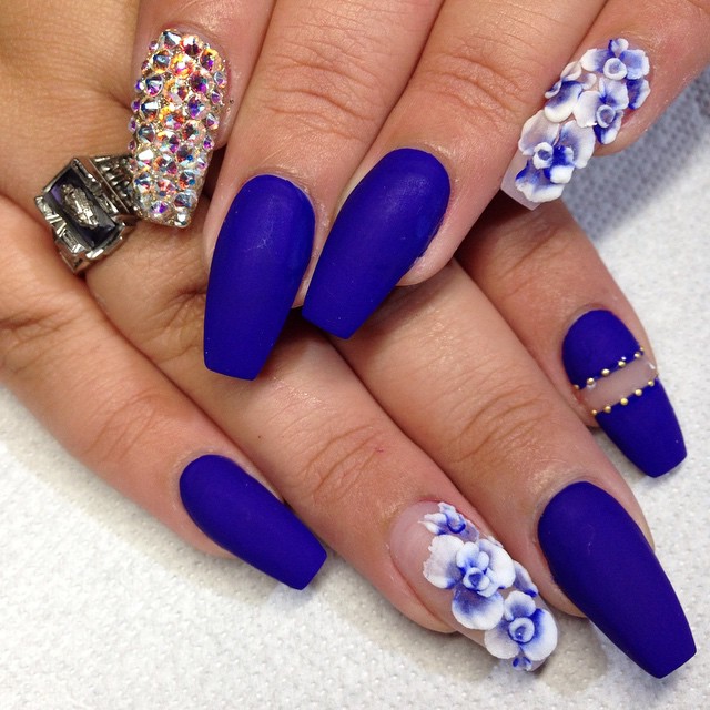 Blue Nails with Flowers and Gems via