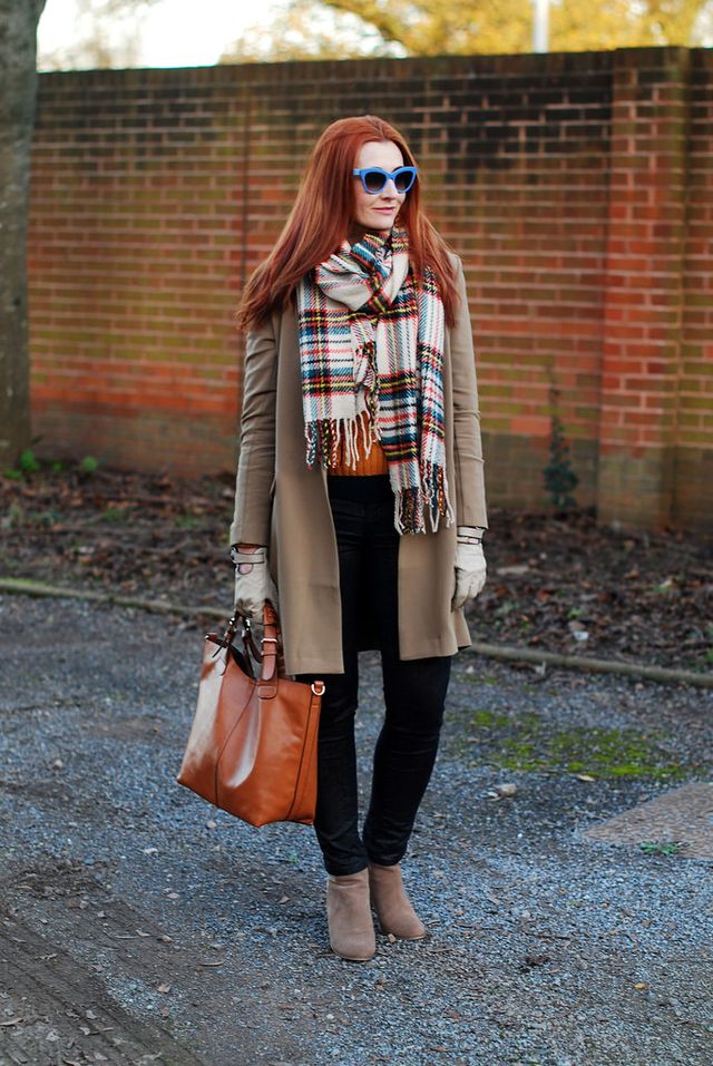 camel-trench-orange-sweater-black-pants-and-tartan-scarf via