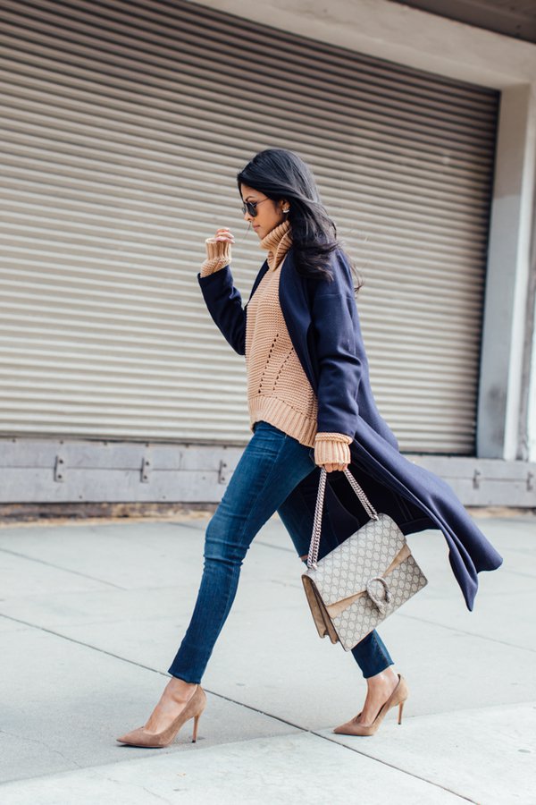 deep-blue-trench-coat-camel-sweater-and-blue-jeans via