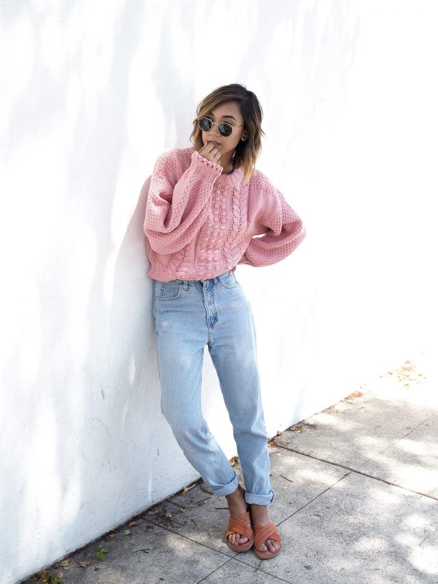 pink-sweater-and-pale-loose-jeans via
