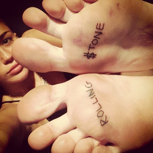Miley Cyrus New Tattoo on her Feet
