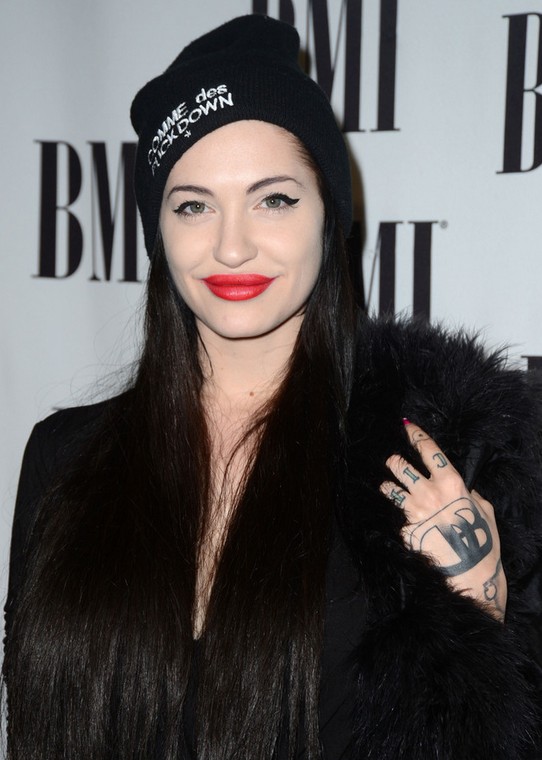 Porcelain Black's Tattoos - Lettering Tattoo on Back of Hand