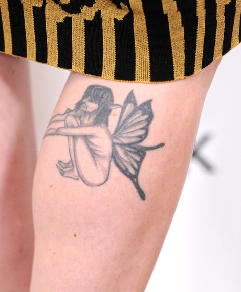 Alexandra Breckenridge's Tattoos - Wings Tattoo on Leg