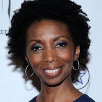 Sharon Washington's Short Curly Hairstyle: Natural and Neat