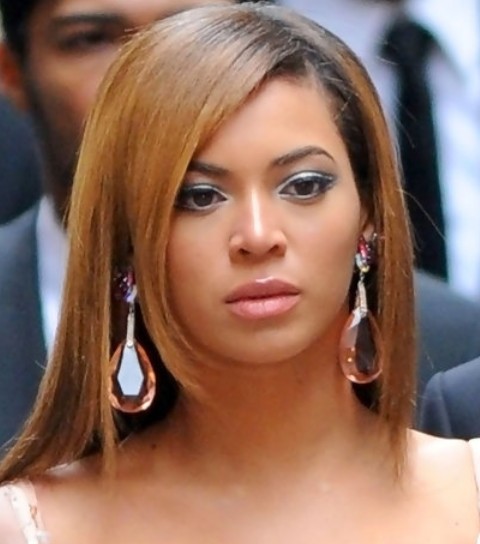Beyonce Hairstyles: Slick Long Straight Haircut with Bangs