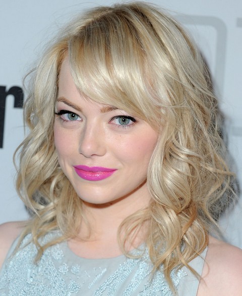 Emma Stone Hairstyles: Modern Medium Curls with Side-parted Bangs