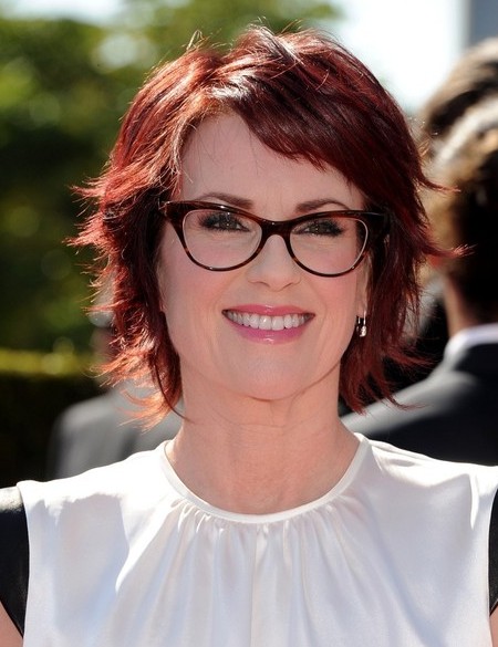 Megan Mullally Layered Short Red Hairstyle for Thick Hair