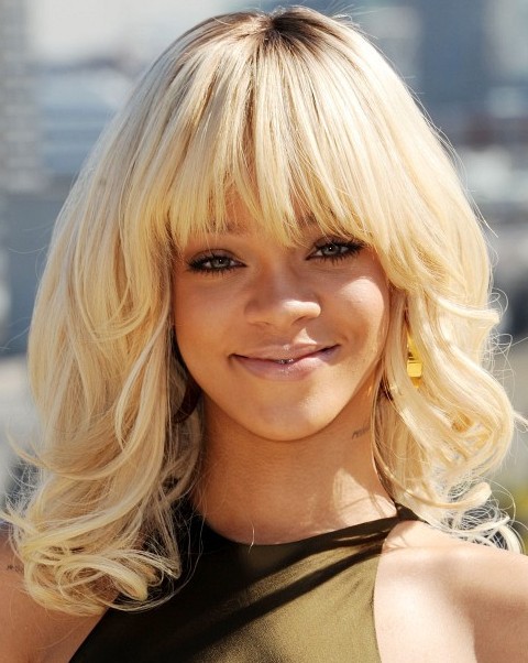 Rihanna Hairstyles: Adorable Long Wavy Haircut with Bangs