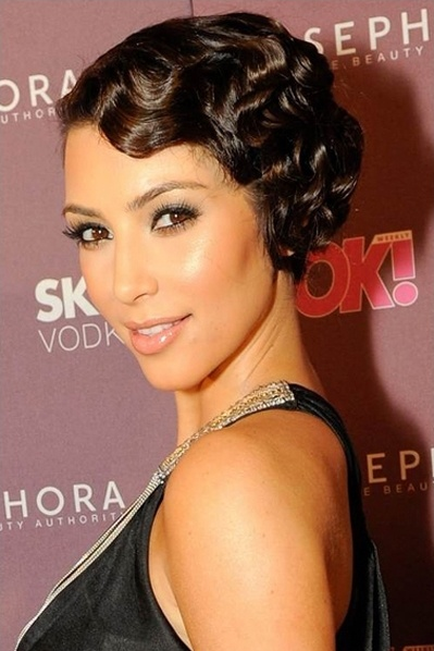 Short Pixie Brunette Curly Hairstyle