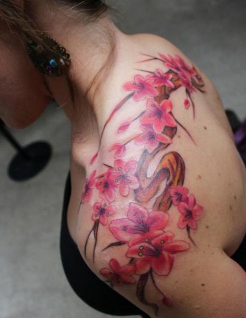 Cherry blossom tattoo on back design
