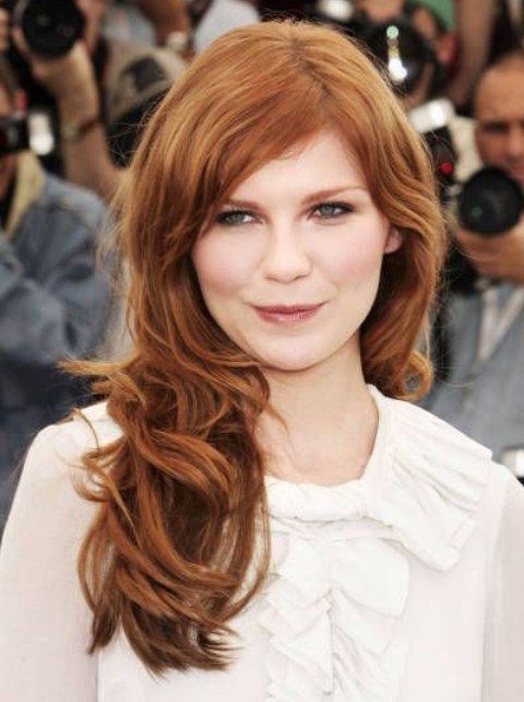 Kirsten Dunst Hairstyles: Side-swept Long Curls