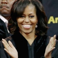 Michelle Obama Hairstyles: Side-parted Medium Curls