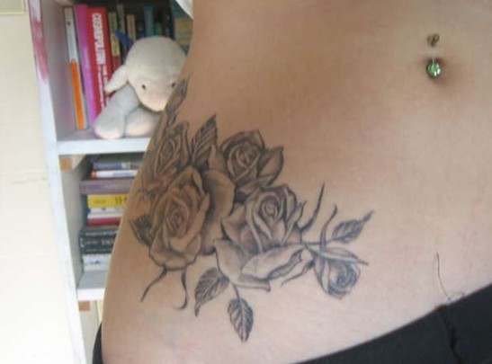Rose tattoos on hip
