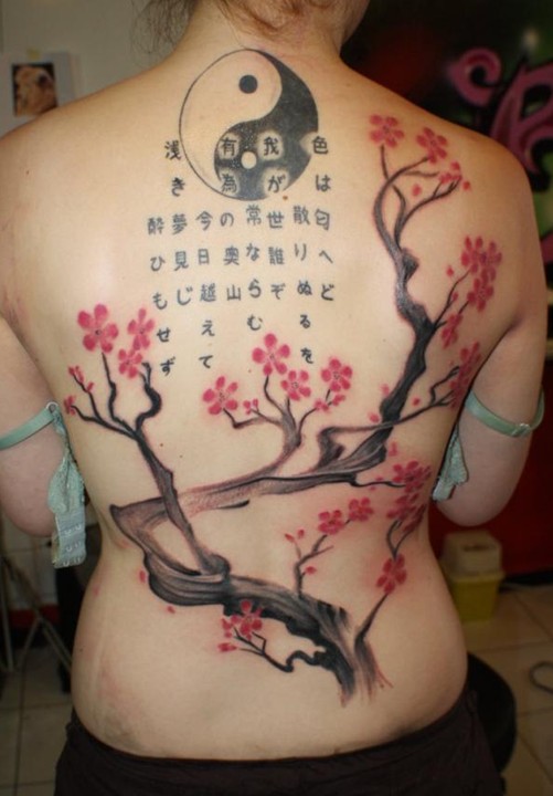 Tattoos Designs for Women: Cherry blossoms tattoo on back