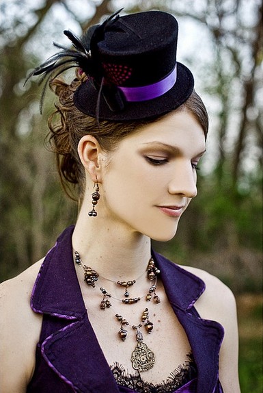 The Curly Wedding Hairstyle with a Black Decorative Hat