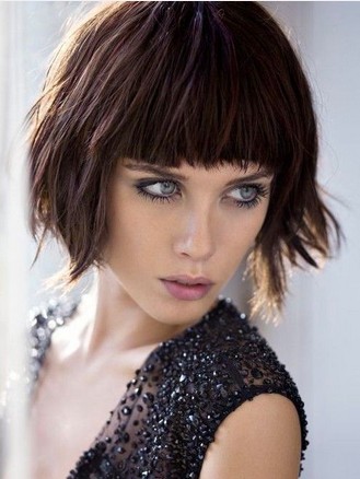The Shaggy Wavy Bob Haircut with Rounded Full Blunt Bangs