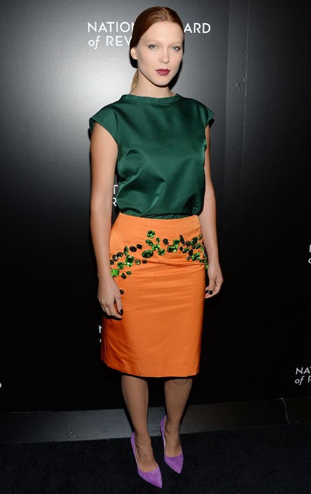 Léa Seydoux Prada silky architectural-collared top in emerald green for jewel-tone spring outfit ideas