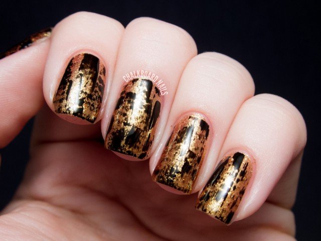 Black and Golden Nails Art Design