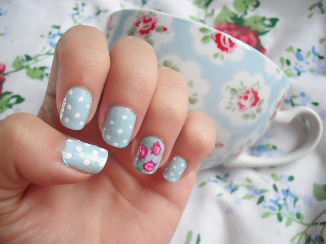 Pastel Blue Floral Nail Design