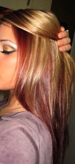 Sleek Blonde Hair With Red Highlights