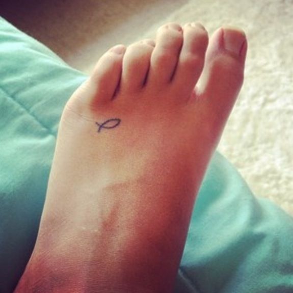 Tiny Fish Tattoo on The Foot