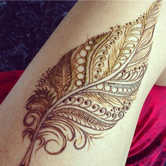 Beautiful Golden Feather Tattoo