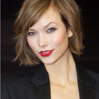 Short Curly Wavy Hairstyle With Bangs