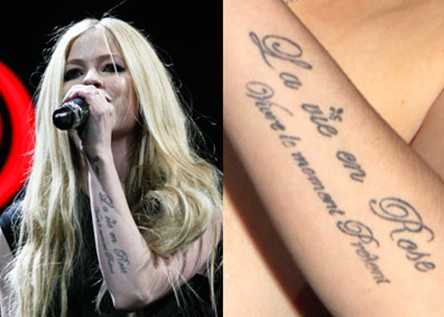 Avril Lavigne tattoos – romantic French arm tattoo