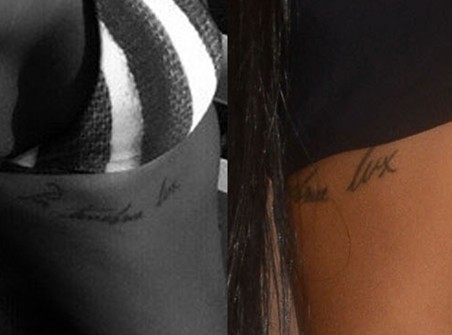 Cassie tattoos – Latin words on ribcage