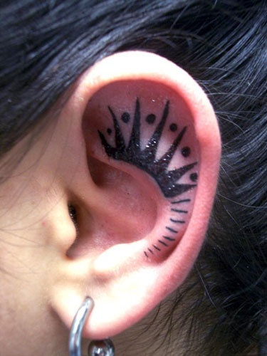 Crown Inner Ear Tattoo