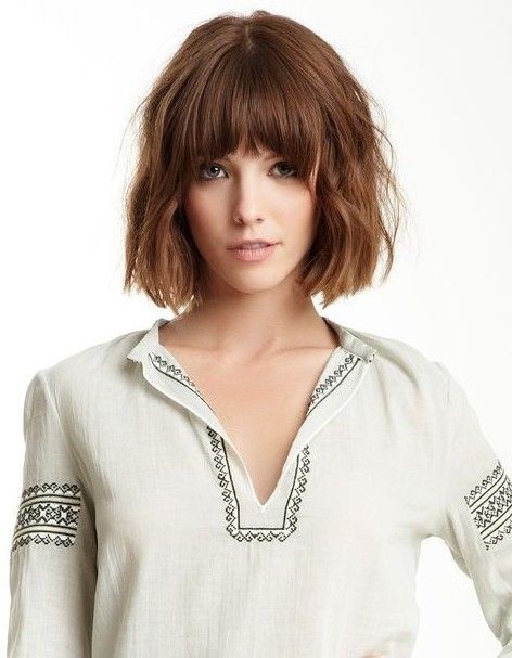 Curly Bob Hairstyle with Blunt Bangs