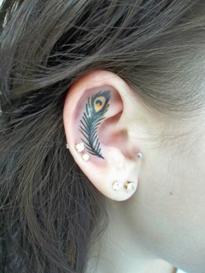 Peacock Inner Ear Tattoo
