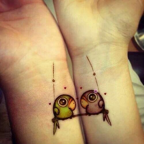 Tiny Bird Wrist Tattoo