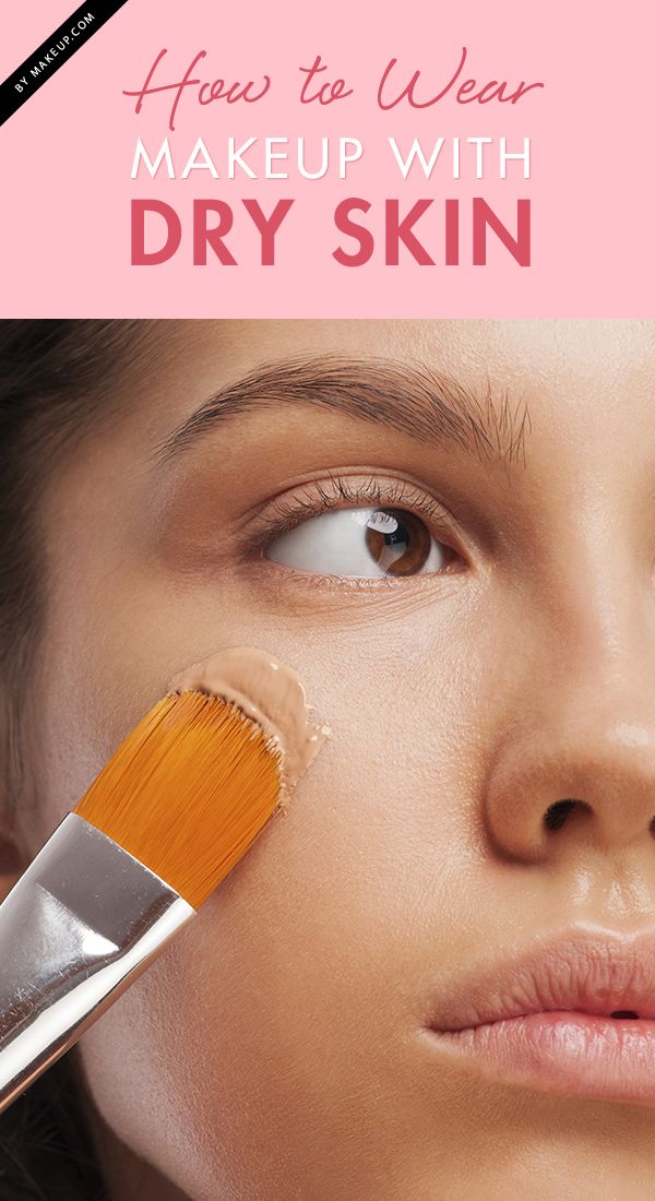 A woman applying foundation