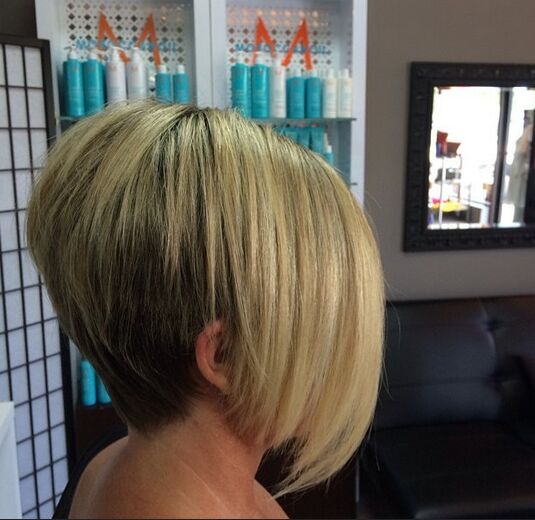 Short Bob Haircut with Long Side Bangs