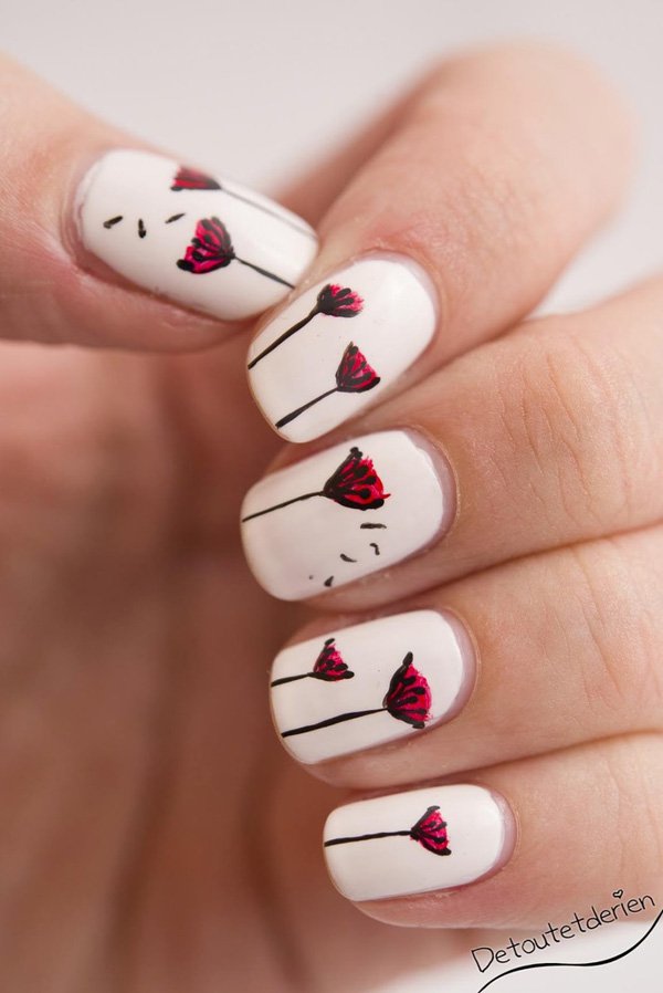 White and Red Dandilion Nail Design