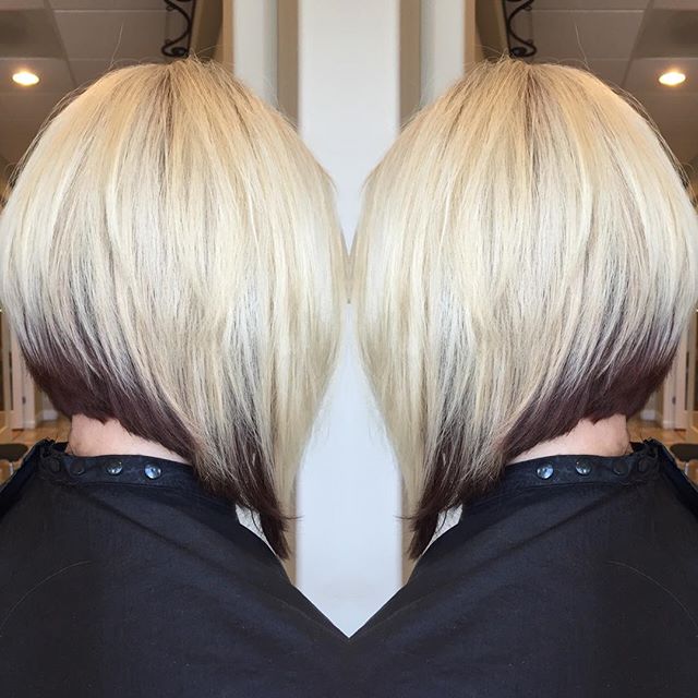 Layered a-line bob hairstyle with dark roots