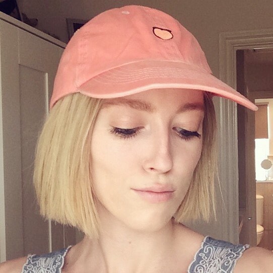 short straight blunt bob cut with hat