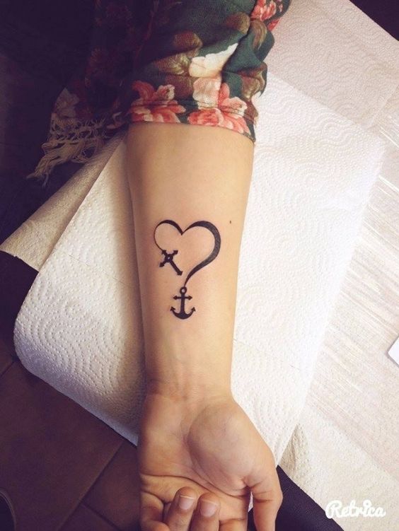 Female anchor tattoos