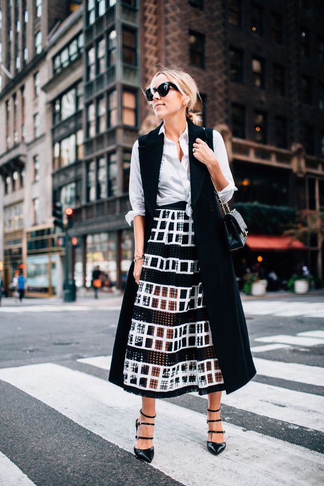 white-shirt-skirt-and-black-long-vest via