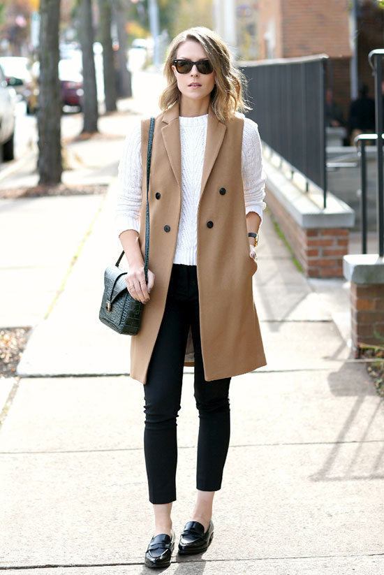 white-sweater-black-pants-and-camel-vest via