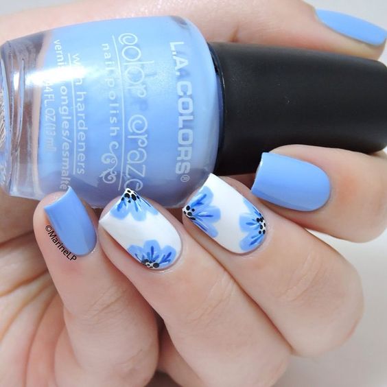 White Nails with Blue Flowers