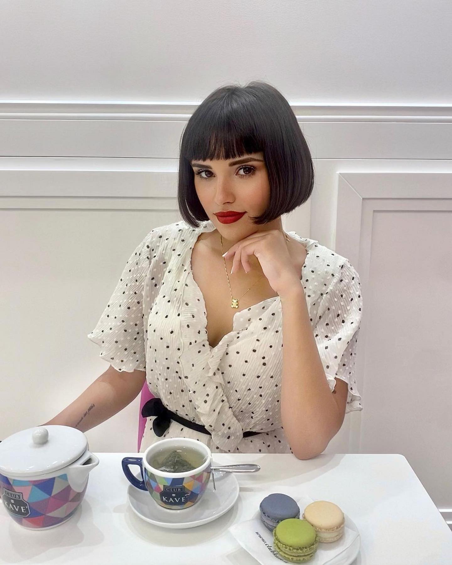 chin length black bob cut with blunt bangs chin length black bob cut with blunt bangs